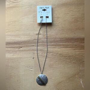 Silver Round Pendant Necklace with Gold Diagonal Accent